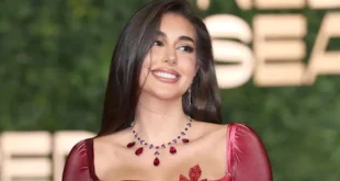 السداد | بحر وباقة ورود.. ياسمين صبري تستعرض جمالها في كان