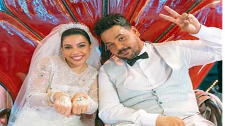 السداد | "حاسة هيجي يوم وتتجوزوا" دنيا سامي بفستان الزفاف مع مصطفى غريب والجمهور يعلق