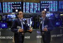 ارتفاع مؤشرات وول ستريت وإغلاق "داو" عند مستوى قياسي