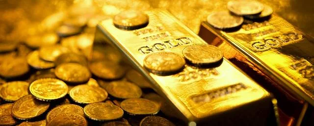 الذهب يحقق مكاسب شهرية بفضل ضعف الدولار وقرار الفيدرالي