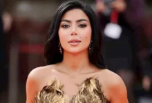 كارولين عزمي تعبر عن سعادتها بتكريمها ومنحها وسام العطاء الوطني في الملتقى العربي