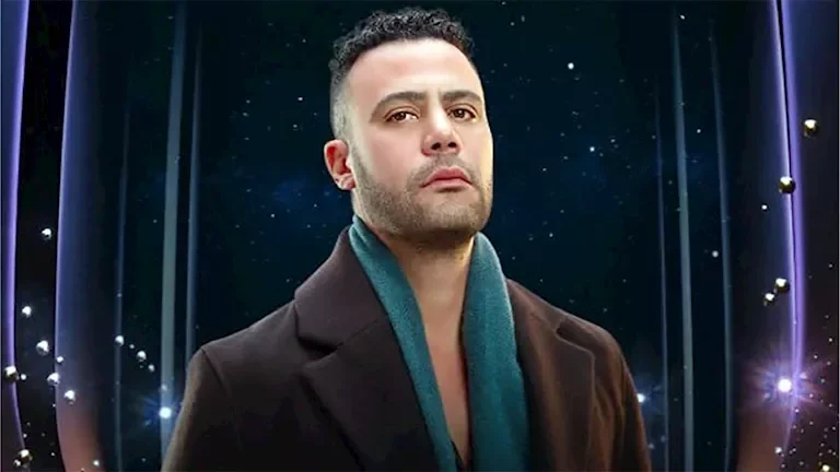 محمد إمام يشارك ذكرياته مع والده عادل إمام بصورة من الطفولة