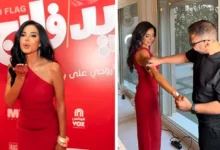 نسرين أمين تتألق بفستان أحمر في العرض الخاص لفيلم "ريد فلاج" بسينما مول مصر